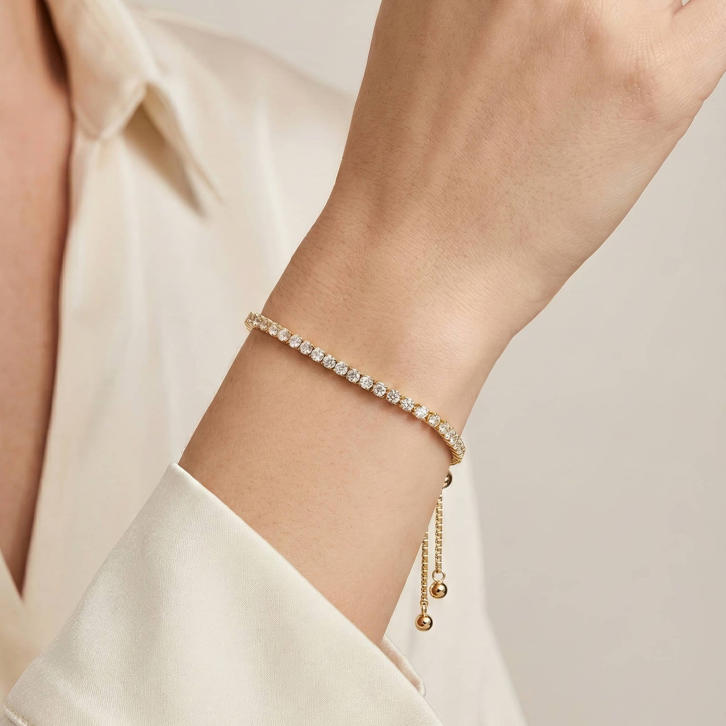 Tennis-armband i 18K guldpläterat mässing