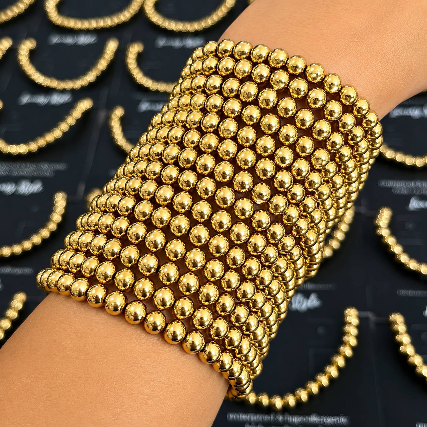 Kularmband i 18K guldpläterat stål – öppet format 8 cm